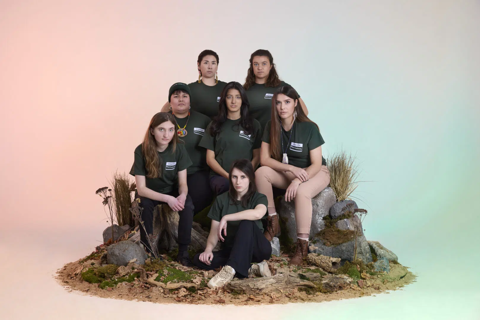 Youth petitioners in Mathur v. Ontario sitting on stumps and rocks